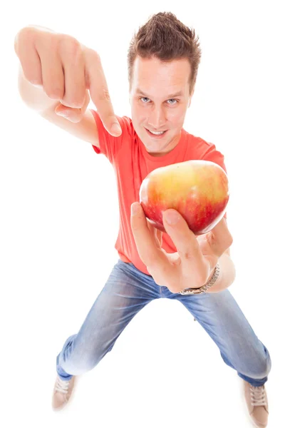 Happy man holding offering apple. Diet health care healthy nutrition. — Stock Photo, Image