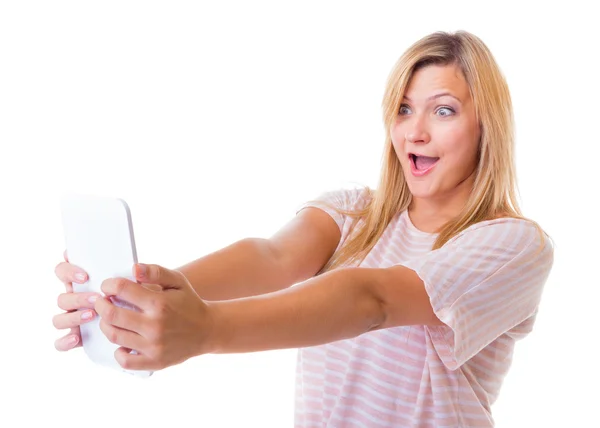 Surprised emotional girl using tablet touchpad e-book e-reader — Stock Photo, Image