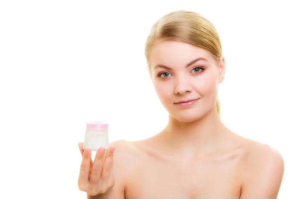 Girl applying moisturizing cream. — Stock Photo, Image