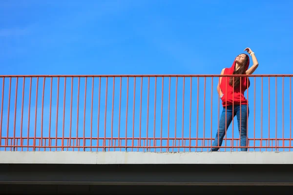 Trendy cool teenage girl on the urban bridge — Stock Photo, Image