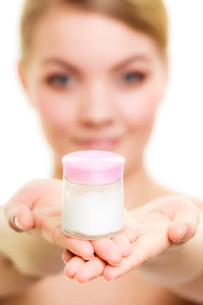Girl applying moisturizing cream. — Stock Photo, Image