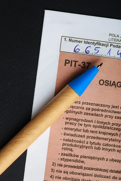 Filling in polish individual tax form PIT-37 for year 2013 — Stock Photo, Image