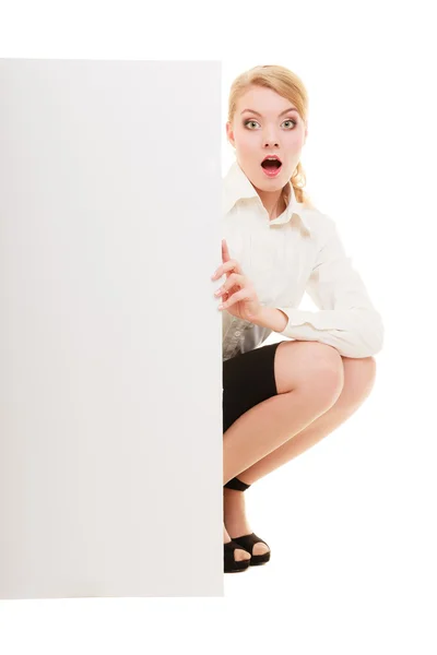 Businesswoman hiding behind blank copy space banner — Stock Photo, Image