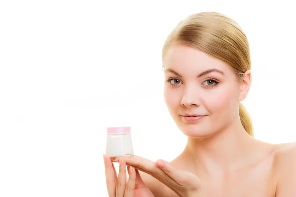 Girl applying moisturizing cream. — Stock Photo, Image