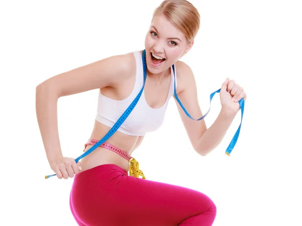 Sporty fit woman with measure tapes. Time for diet slimming. — Stock Photo, Image