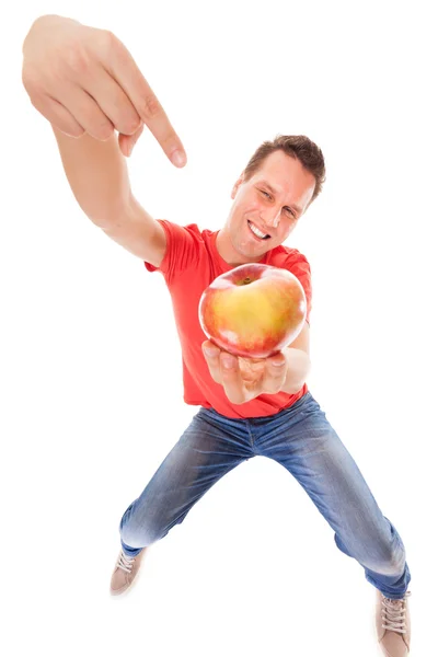 Happy man in holding offering apple. Diet health care healthy nutrition. — Stock Photo, Image