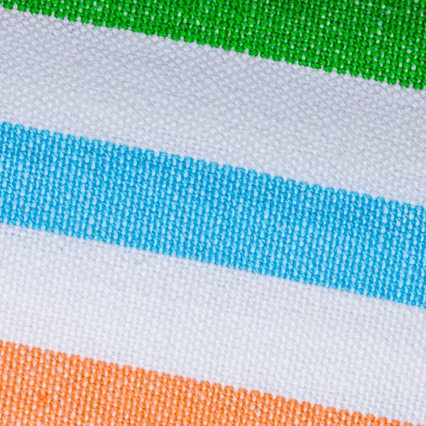 Primer plano del textil a rayas de colores como fondo o textura —  Fotos de Stock