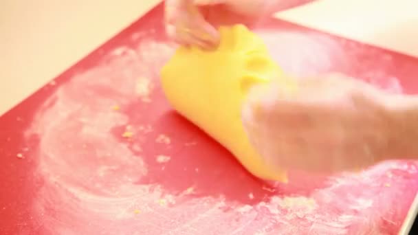 Housewife or chef making dough on pastry board — Stock Video