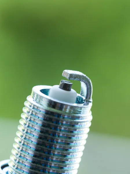 New spark plug as spare part of car. — Stock Photo, Image