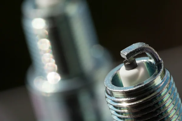 Two new spark plugs as spare part of car. — Stock Photo, Image