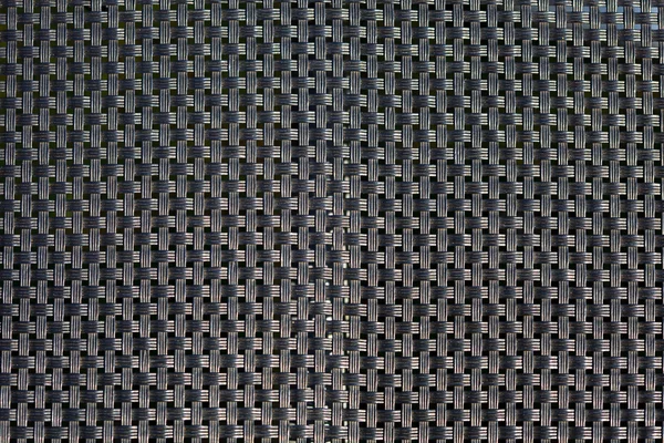 Black plastic weave as woven background texture — Stock Photo, Image