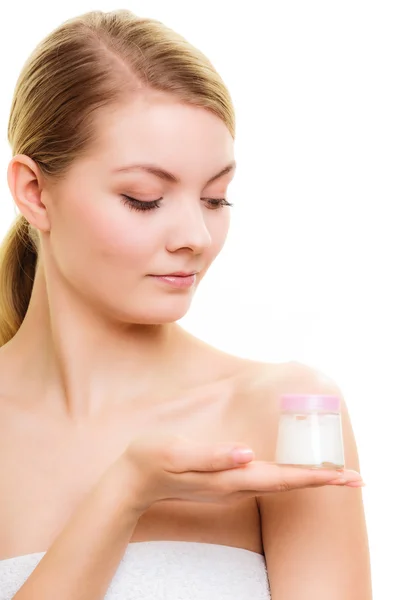 Girl applying moisturizing cream. — Stock Photo, Image