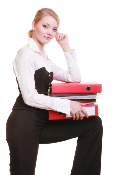 Businesswoman carrying stack of documents Stock Picture