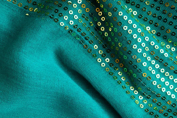 Yeşil sequine arka plan doku soyut bir bez dalgalı kıvrımlar Tekstil — Stok fotoğraf