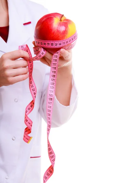 Hands of doctor nurse recommending healthy food. — Stockfoto