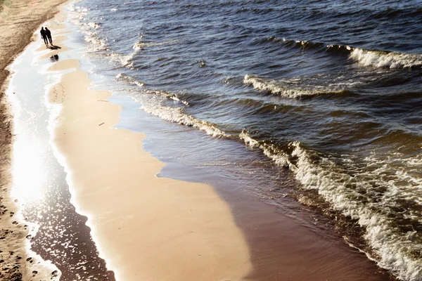 Closeup of water waves at sandy beach. — Stock Photo, Image