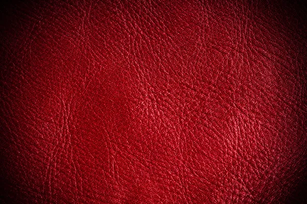 Red textured leather grunge background closeup — Stock Photo, Image