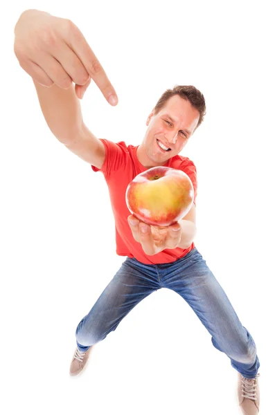 Happy man in holding offering apple — Stock Photo, Image