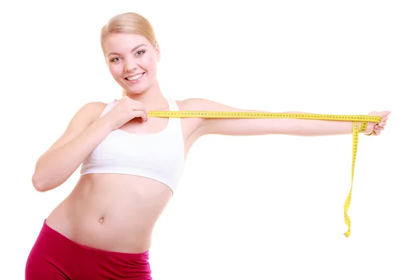 Fitness woman  with measure tape — Stock Photo, Image