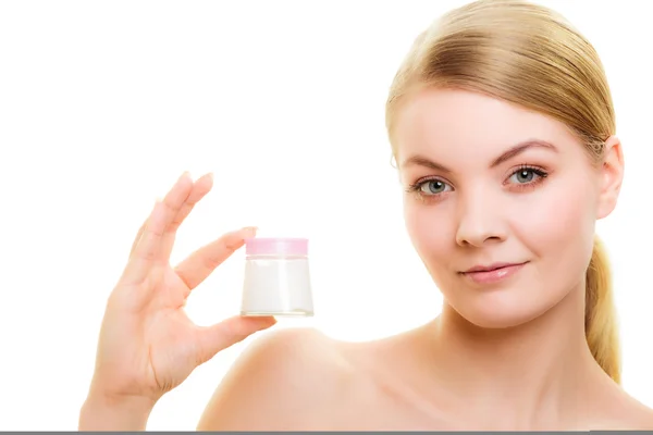 Girl applying moisturizing cream. — Stock Photo, Image