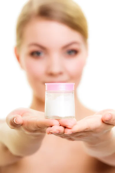 Girl applying moisturizing cream. — Stock Photo, Image