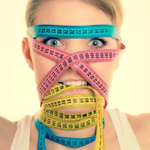 Woman with measure tapes. — Stock Photo, Image