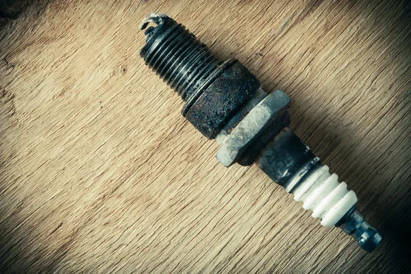 Old spark plug as spare part of car. — Stock Photo, Image