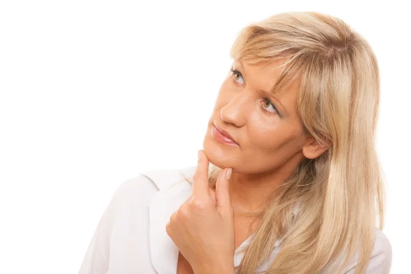 Thinking mature woman looking up — Stock Photo, Image