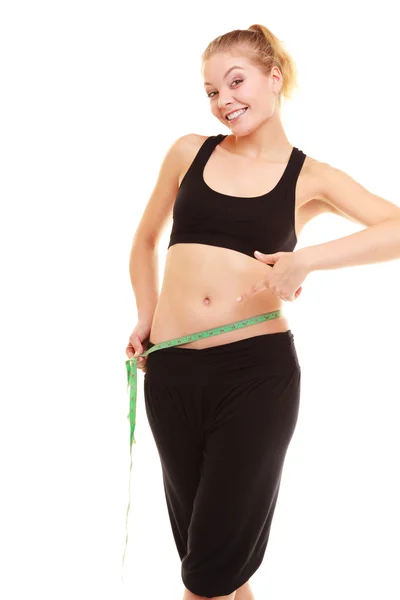 Menina loira magro com fita métrica cintura de medição — Fotografia de Stock
