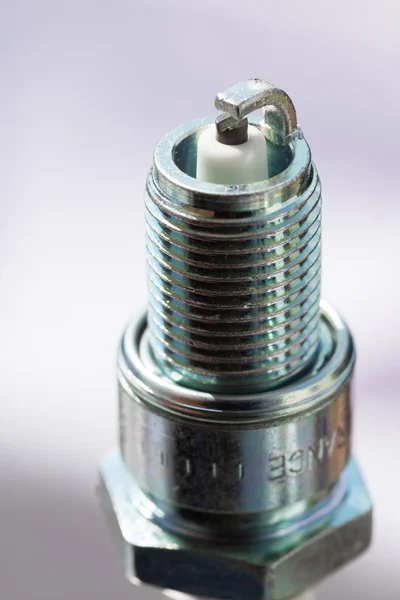 New spark plug as spare part of car — Stock Photo, Image