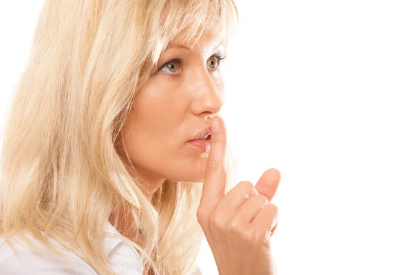 Woman asking for silence finger on lips — Stock Photo, Image