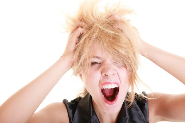 Woman screaming and pulling messy hair — Stock Photo, Image