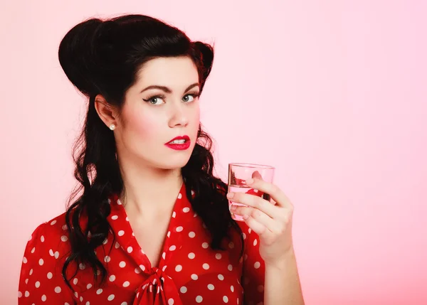 Pinup girl drinking water — Stock Photo, Image