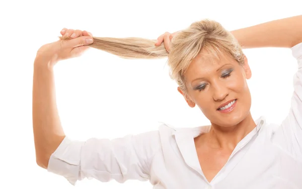 Woman holding her long hair Stock Photo