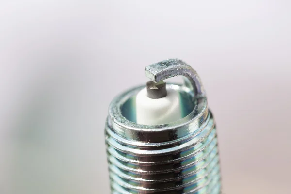 New spark plug as spare part of car — Stock Photo, Image
