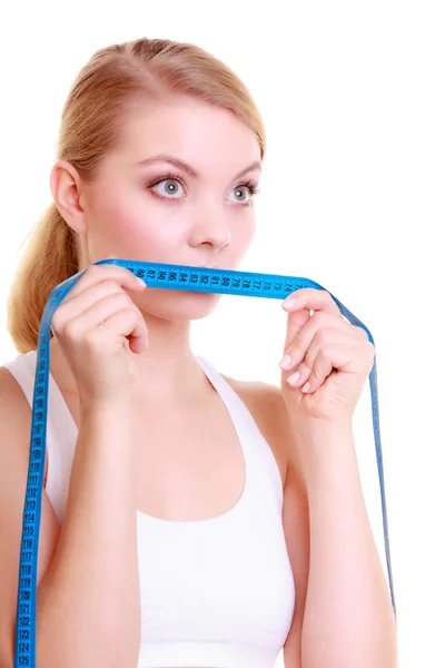 Woman covering her mouth with measuring tape — Stock Photo, Image