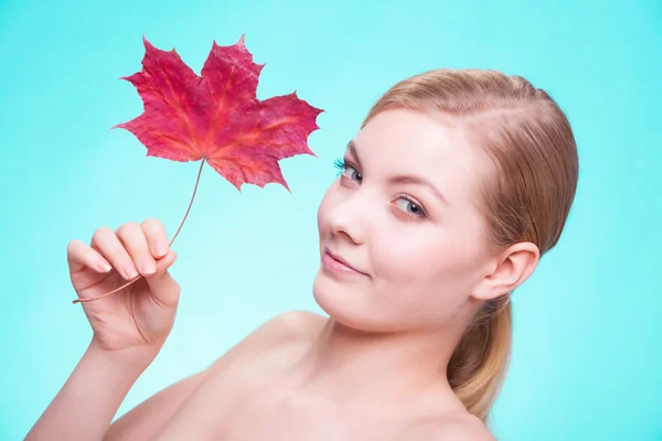 Girl with red maple leaf — Stock Photo, Image