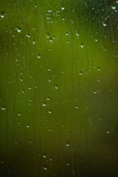 Gotas de água no vidro como fundo — Fotografia de Stock