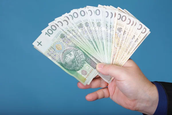 Üzletember gazdaság pénz lengyel bankjegy — Stock Fotó