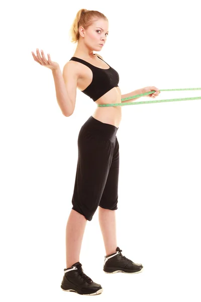 Diet. slim blonde girl with measure tape measuring waist — Stock Photo, Image