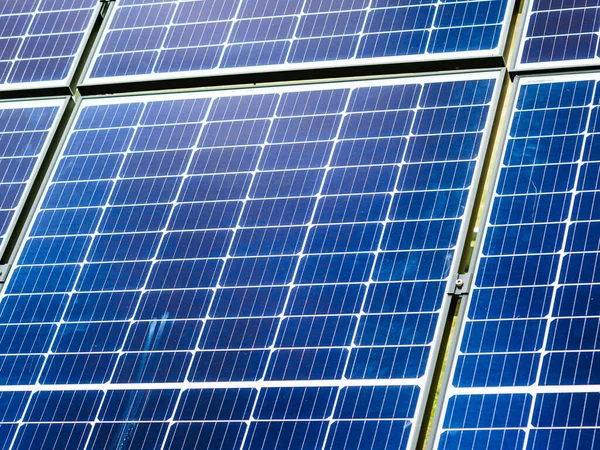 Close Solar Photovoltaic Panels Charging Batteries Renewable Green Clean Alternative — Stock Photo, Image