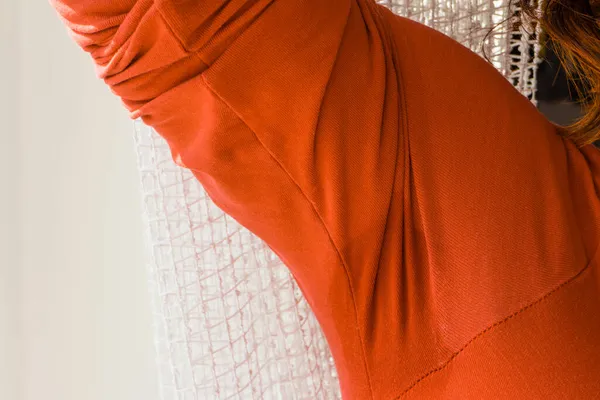 Woman Having Sweat Stains Orange Shirt Long Sleeve Diaphoresis Problem — Stock Photo, Image