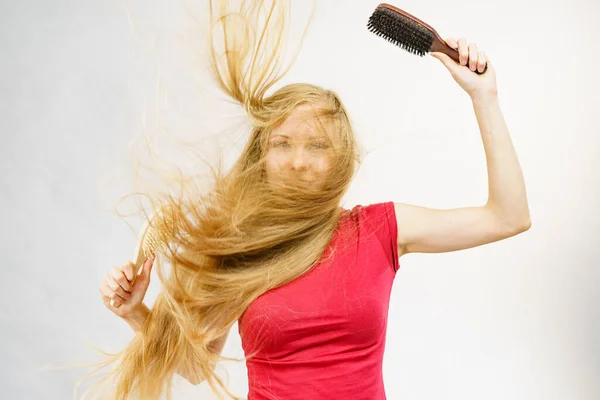 Blonde Girl Long Blowing Hair Holds Two Brushes One Natural — Stock Photo, Image