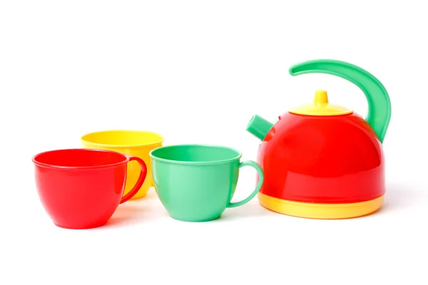 Чайник и три чашки — стоковое фото