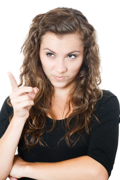 Junges Weibchen zeigt mit Zeigefinger — Stockfoto