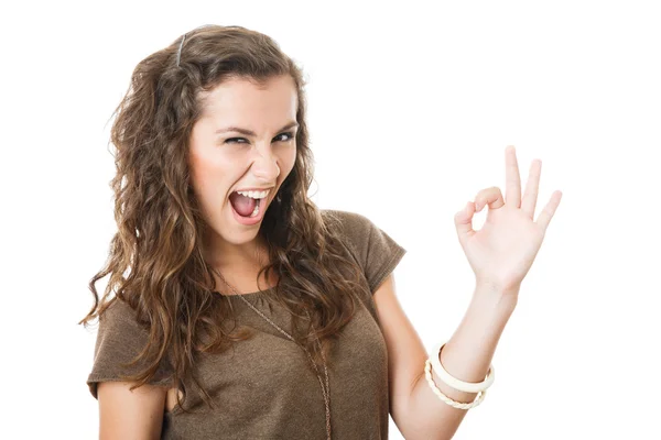 Young female showing ok sign Stock Photo