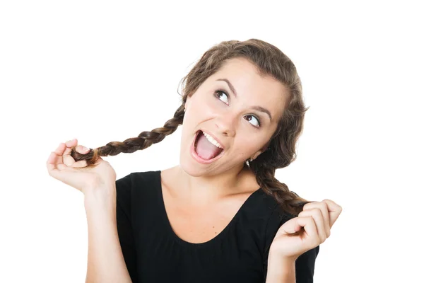 Young female playing with her braids Stock Picture