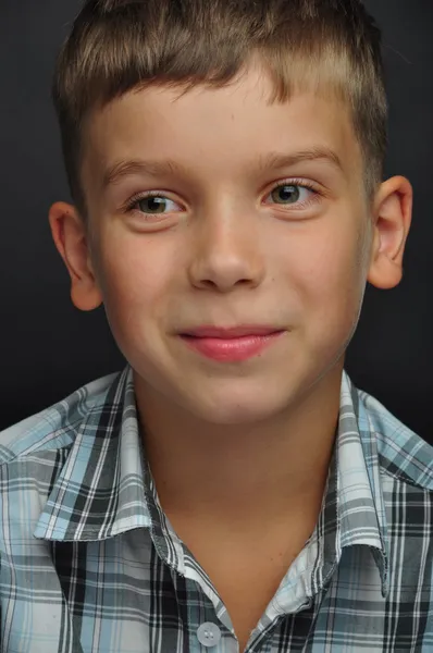 Emotional beautiful boy in the studio — Stock Photo, Image