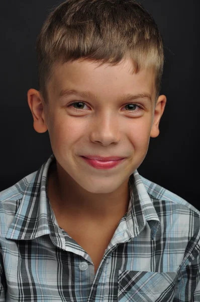 Emotional beautiful boy in the studio — Stock Photo, Image