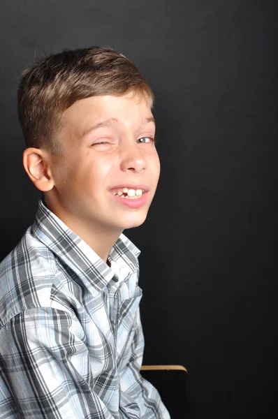 Emotional beautiful boy in the studio — Stock Photo, Image